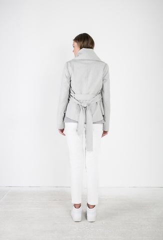 OSKAR grey woollen trench jacket and white skinny leg pants