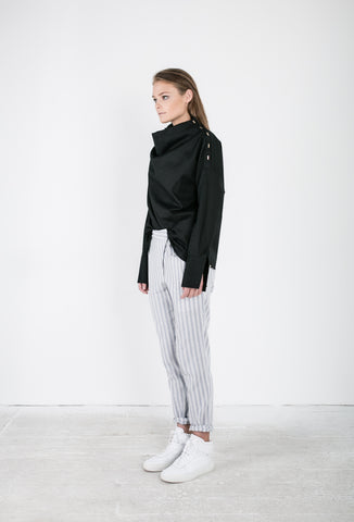 OSKAR black funnel neck long-sleeved shirt and striped pants with tie