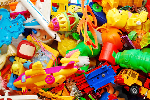 Messy Pile of Brightly Coloured Plastic Toys
