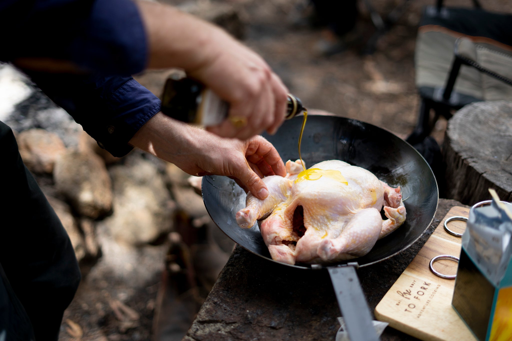 Give the beer can chicken a good rubbing over with some olive oil infused with lemon. We used cobrham estate lemon infused oil which has a very intense flavour. Now your hands are slippery with lemon oil don't drop your beer mate. Get ready now for the chooks costume of lemongrass and ginger tea with a sprinkle of salt and pepper.