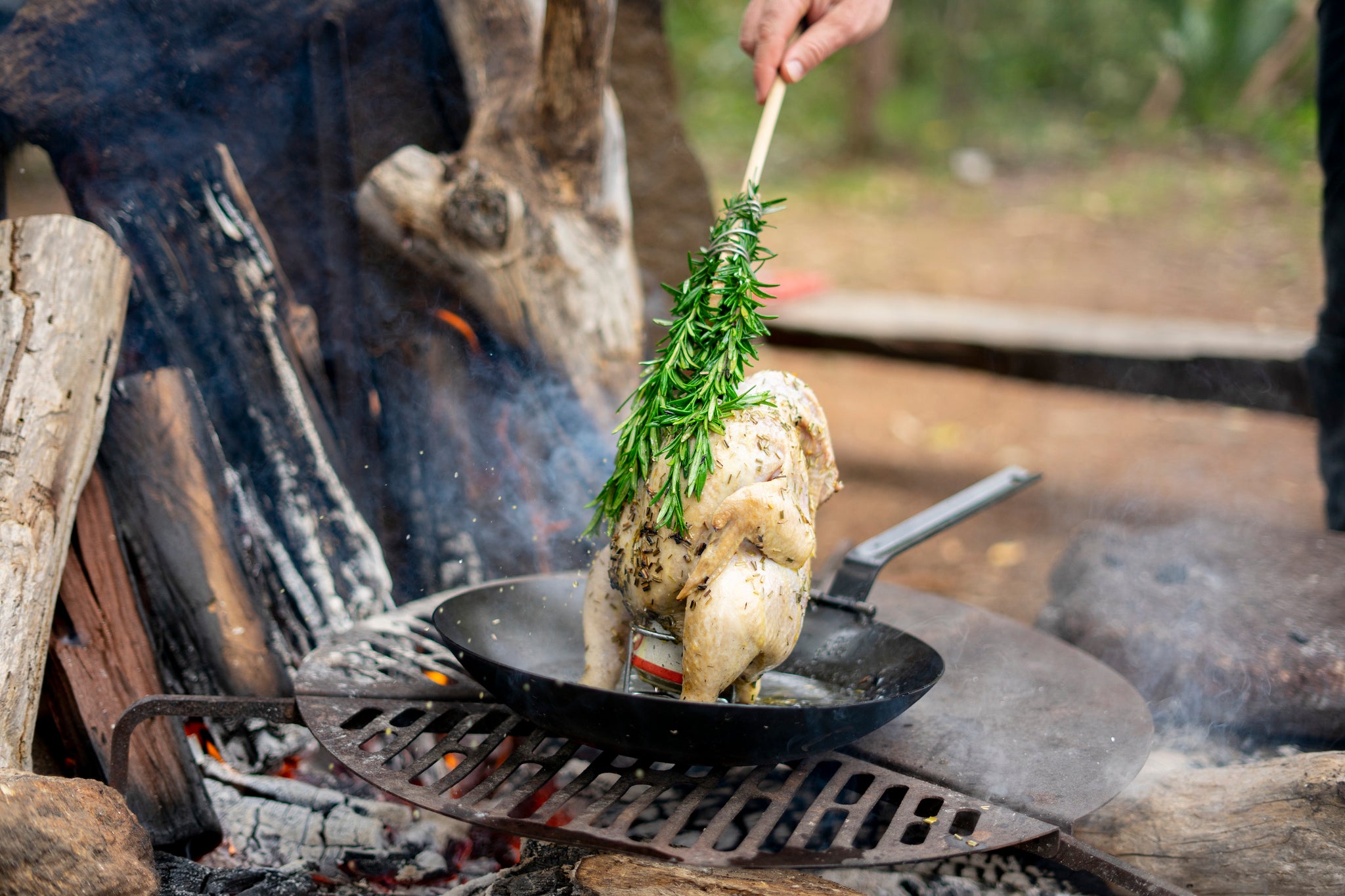 Little bit of basting here and there using the drippings caught in the Hillbilly wok. This kept the skin from crisping up too much during the cooking. When the chook was almost done we let it crips up nicely ready to be served.