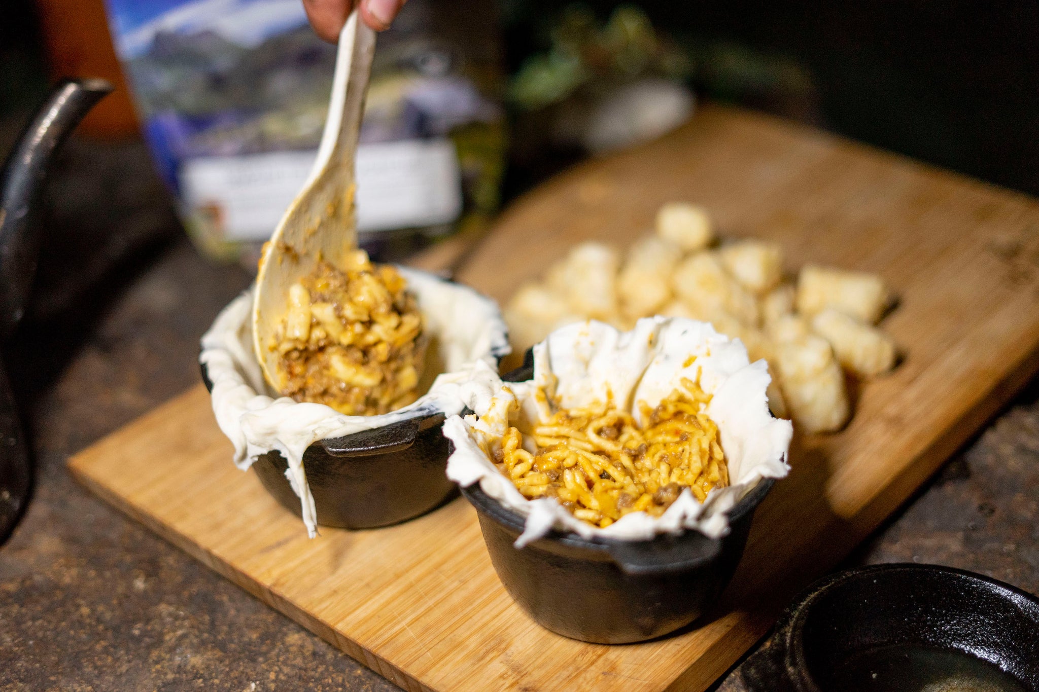 the first step of the cast iron pies is filling with a Campers Pantry dinner. This one was spaghetti bolognese.