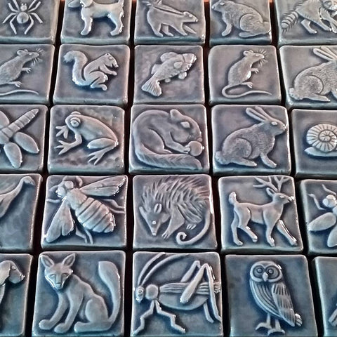 blue handmade animal tiles