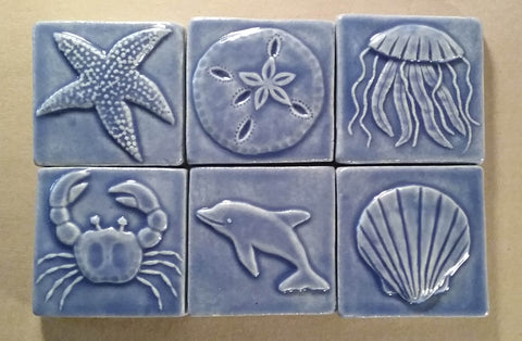 sea life handmade tiles in blue glaze, three inch size