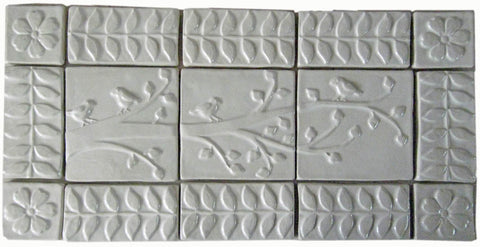 handmade tile set, "birds on a branch with 3" border" in white glaze