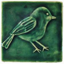 ceramic chickadee bird arts and crafts tile, leaf green