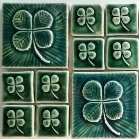 handmade tiles featuring four leaf clovers, green glaze