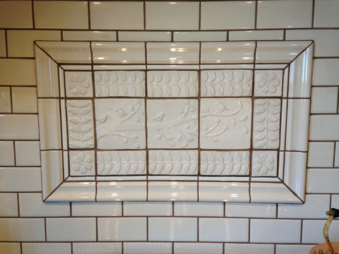 handmade tiles installed in kitchen, white glaze