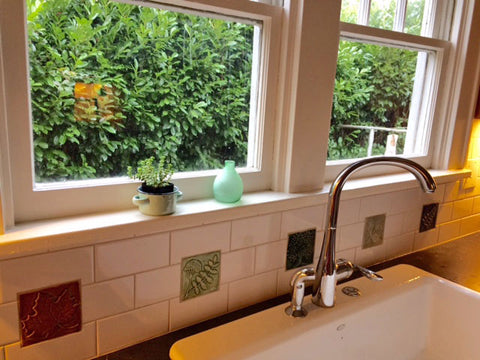 four inch handmade tiles installed with subway tiles