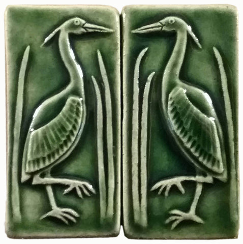 pair of herons two inch by four inch handmade tile set