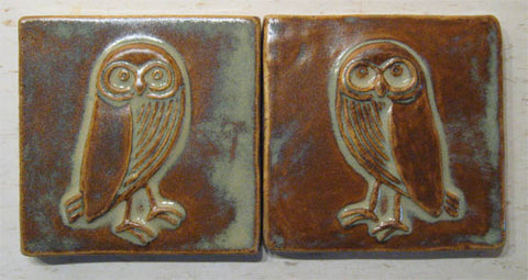a pair of handmade owl tiles