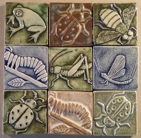 handmade tiles featuring insects and animals for the river light gallery in peninsula ohio