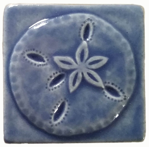 sanddollar handmade tile in blue glaze, three inch by three inch size