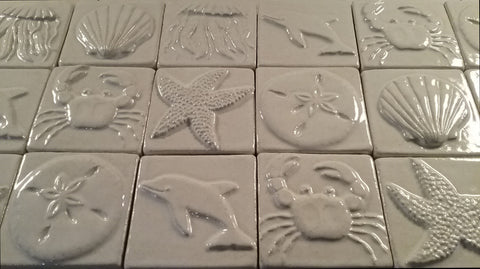 white sea creature handmade tiles close up