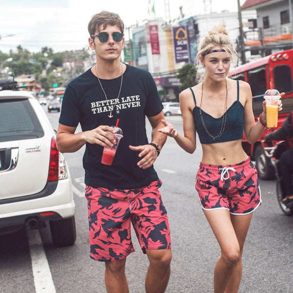 husband and wife matching bathing suits