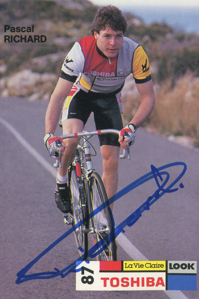 This Toshiba La Vie Claire postcard from the 1987 season is signed by Pascal Richard who went onto to become the 1996 Olympic RR Champion at the Atlanta Games.