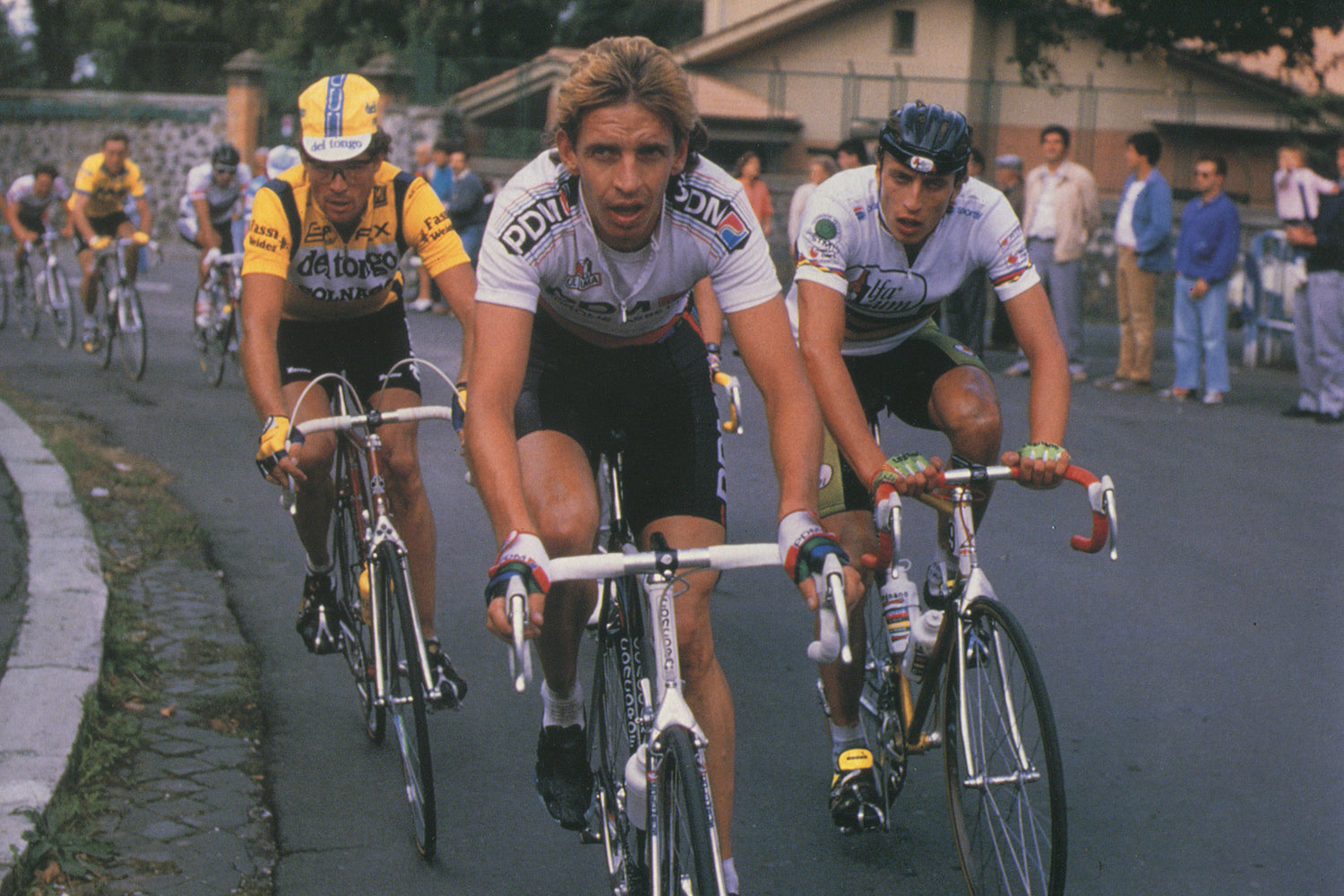 Steven Rooks (PDM) leads Luca Rota (Del Tongo) and Maurizio Fondriest (Alfa Lum) in his new world champion jersey at the Giro del Lazio in 1988.