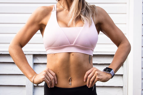 Woman in a pink sports bra