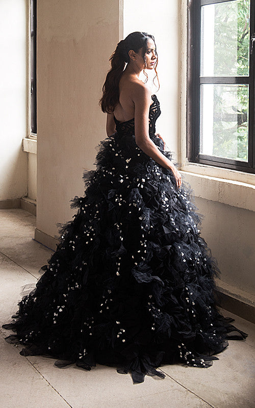 Mouni Roy wore a black strapless gown with a tulle and floral applique ball gown skirt by Karleo at Golden Petals Award