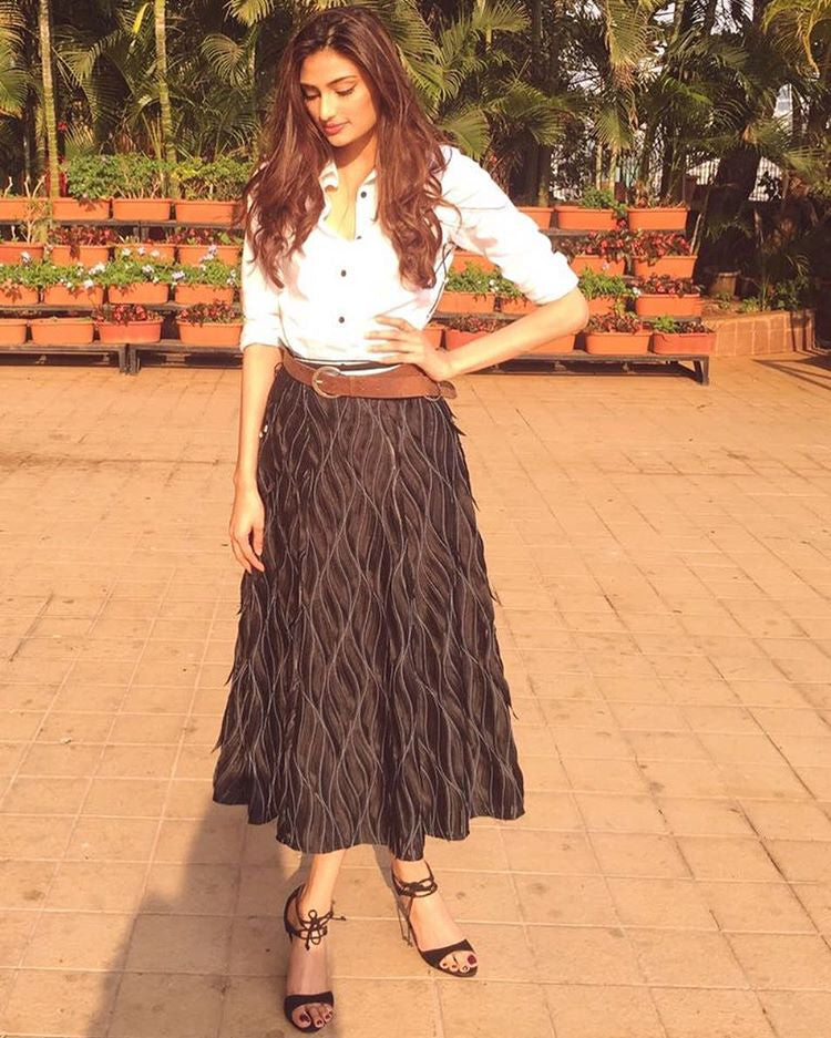 Athiya Shetty in 431-88 by Shweta Kapur's white shirt and a black textured midi skirt