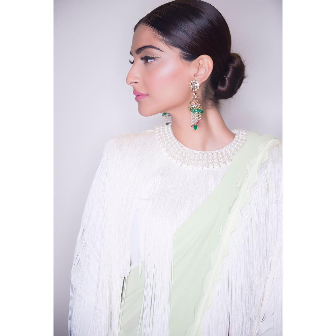 We're totally crushing over Sonam and Rhea Kapoor's latest experiment with sarees.