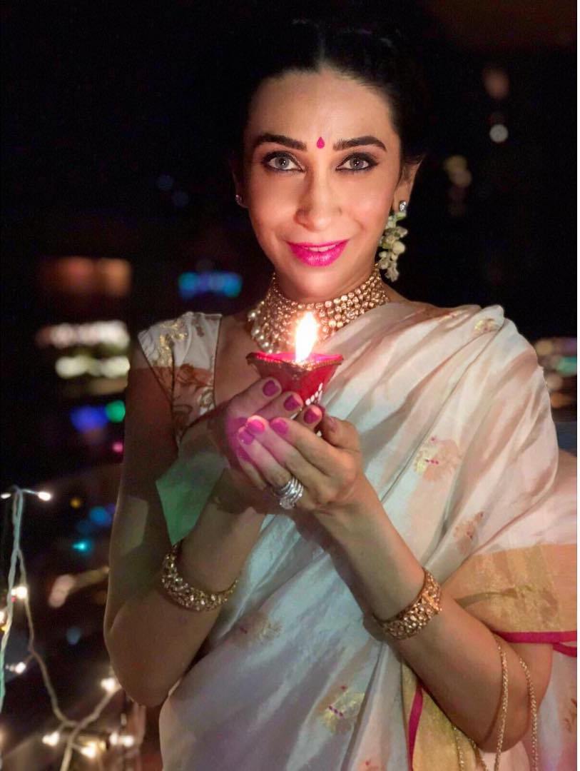 Karisma Kapoor Slays Her Traditional Avatar With White And Pink Cotton Silk Saree