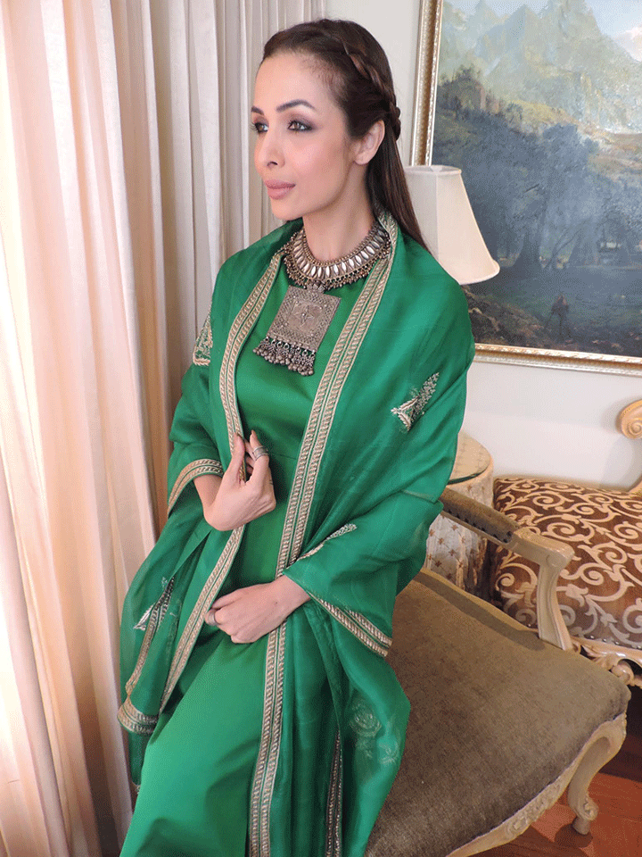 Malaika Arora Khan in raw mango collection's designer green raw silk salwar suit