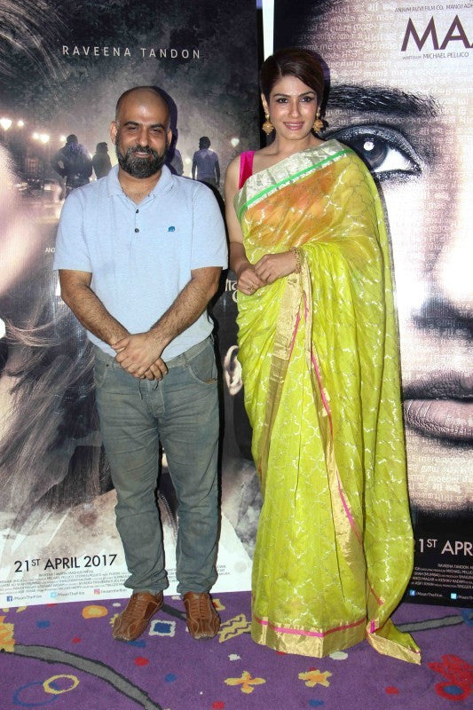 Raveena Tandon  in a lime green saree with gold zellige print from Madhurya creations at the trailer launch of her upcoming film, 'Maatr' at an event held in Mumbai