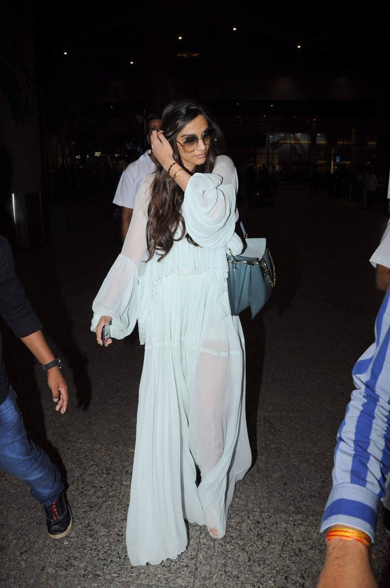 Sonam Kapoor in Chloe Spring 2015 Collection's Maxi Dress with bat sleeves design at Airport