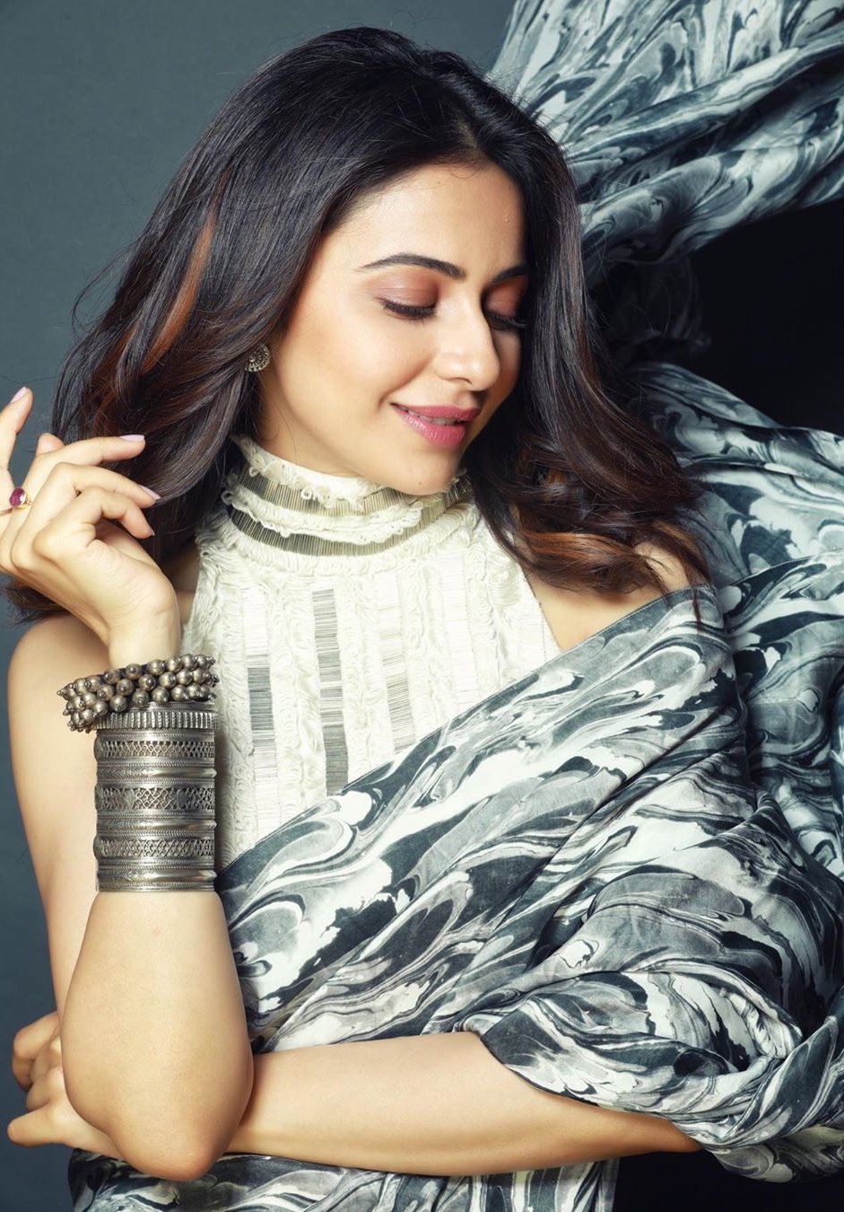 Rakul Preet Singh in Marbled-Effect Printed Saree from Limerick's Collection