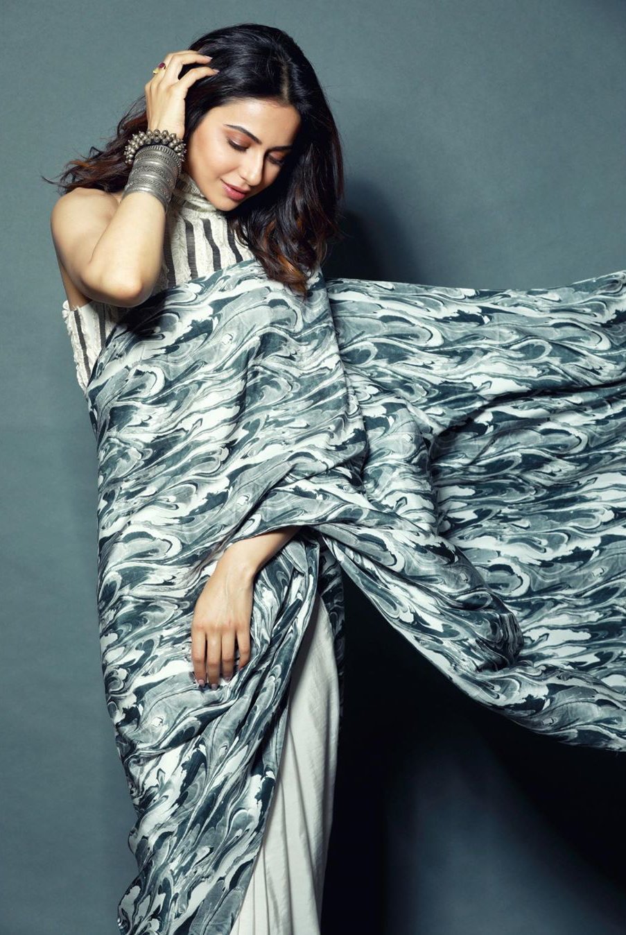 Rakul Preet Singh in Marbled-Effect Printed Saree from Limerick's Collection