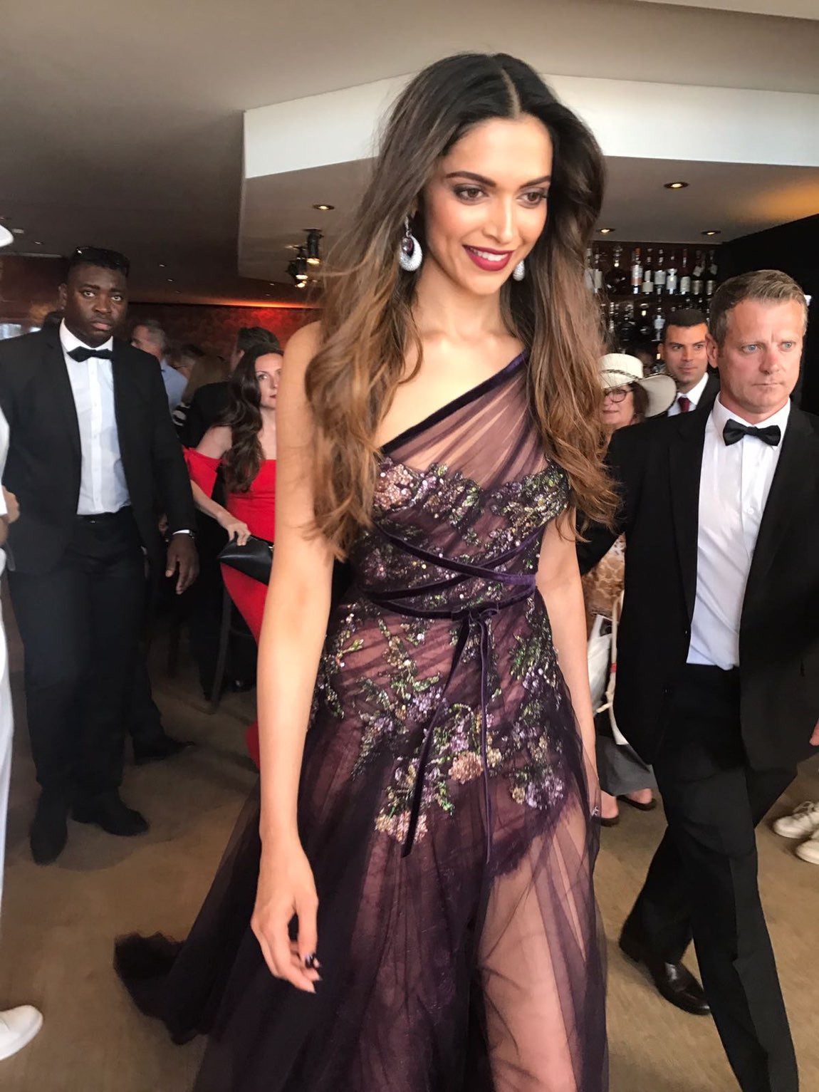 Deepika Padukone walked the red carpet for the Cannes Film Festival wore a sheer purple Marchesa outfit, and paired it with De Grisogono jewelry and Jimmy Choo heels