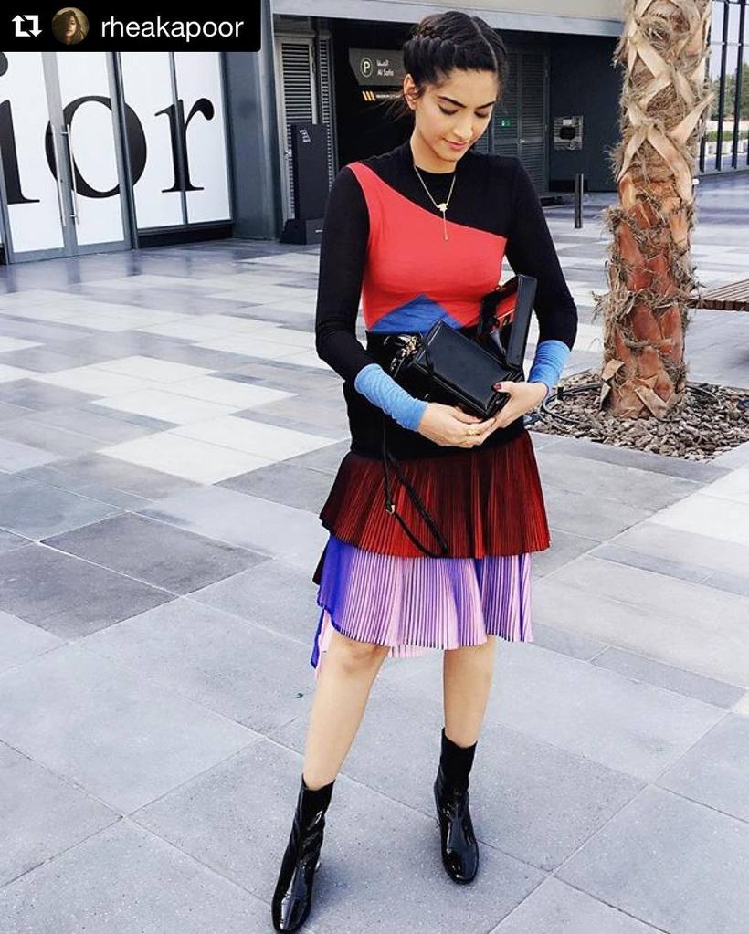 Sonam Kapoor In Black & red color block pattern top with two-toned pleated skirts