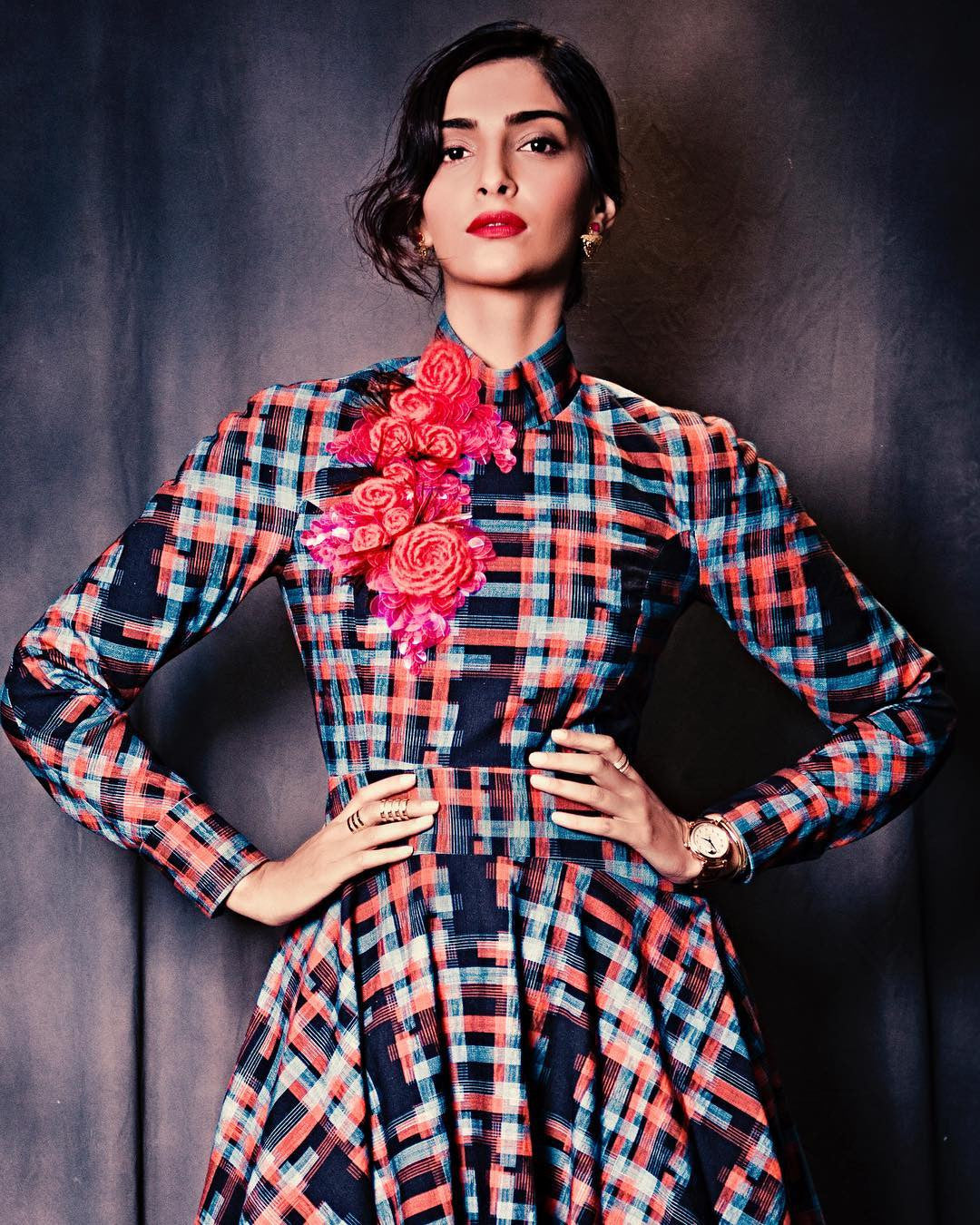 Sonam Kapoor picked out a beautiful red, blue and black checked midi from Delpozo‘s Pre-Fall 2017 