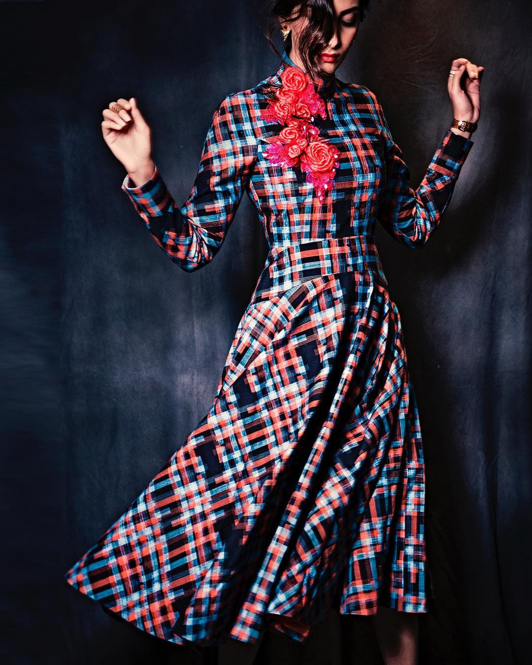 Sonam Kapoor picked out a beautiful red, blue and black checked midi from Delpozo‘s Pre-Fall 2017 