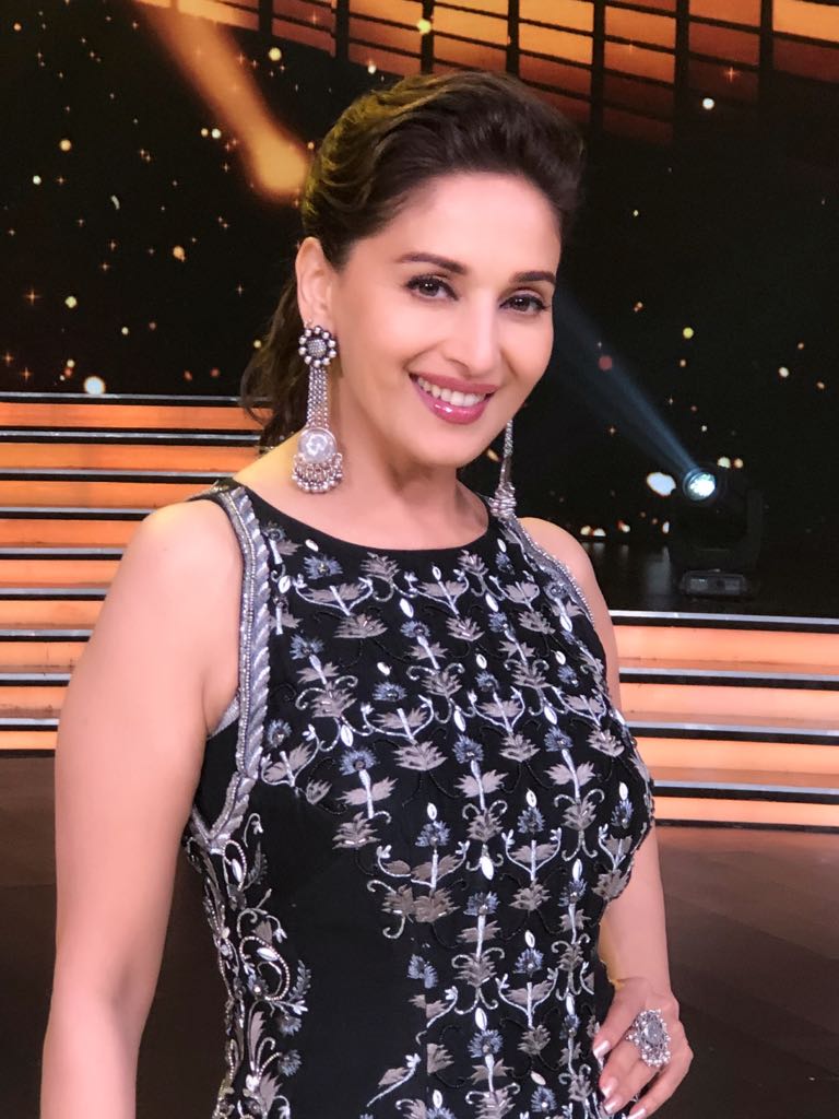 Madhuri-Dixit-in-black-and-white-embroidered-long-tunic-with-a-black-skirt