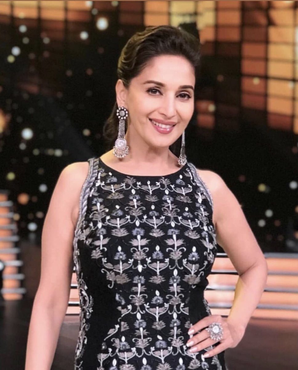 Madhuri-Dixit-in-black-and-white-embroidered-long-tunic-with-a-black-skirt