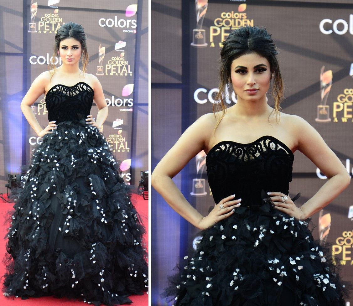 Mouni Roy wore a black strapless gown with a tulle and floral applique ball gown skirt by Karleo at Golden Petals Award