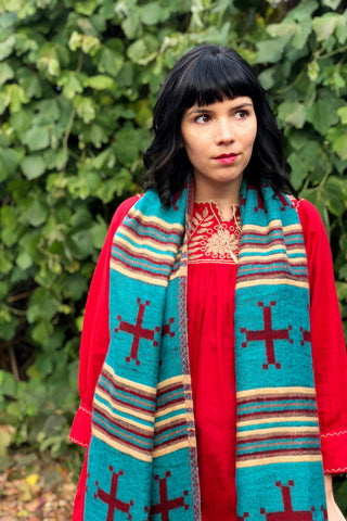 ShopMucho owner styles ways to wear the southwest style shawl with the Mexican blouse and skinny jeans