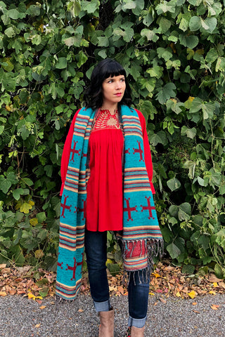 ShopMucho owner styles ways to wear the southwest style shawl with the Mexican blouse and skinny jeans