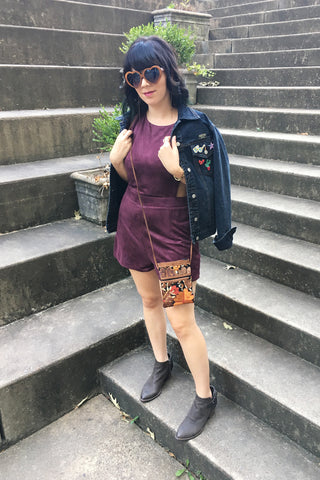 ShopMucho owner styles the suede cutout romper in eggplant for fall