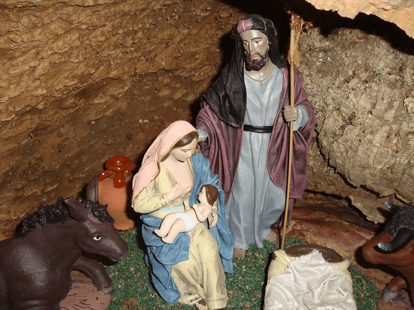 Biblical scene breastfeeding figurines
