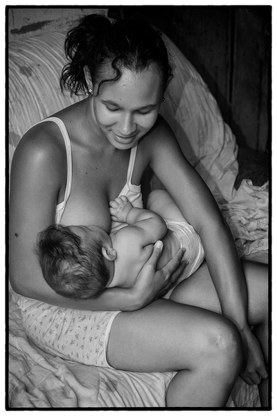 Breastfeeding baby black and white