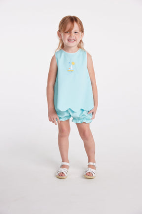 classic childrens clothing girls bloomer set in aqua with bow in the back and applique sailboat on chest