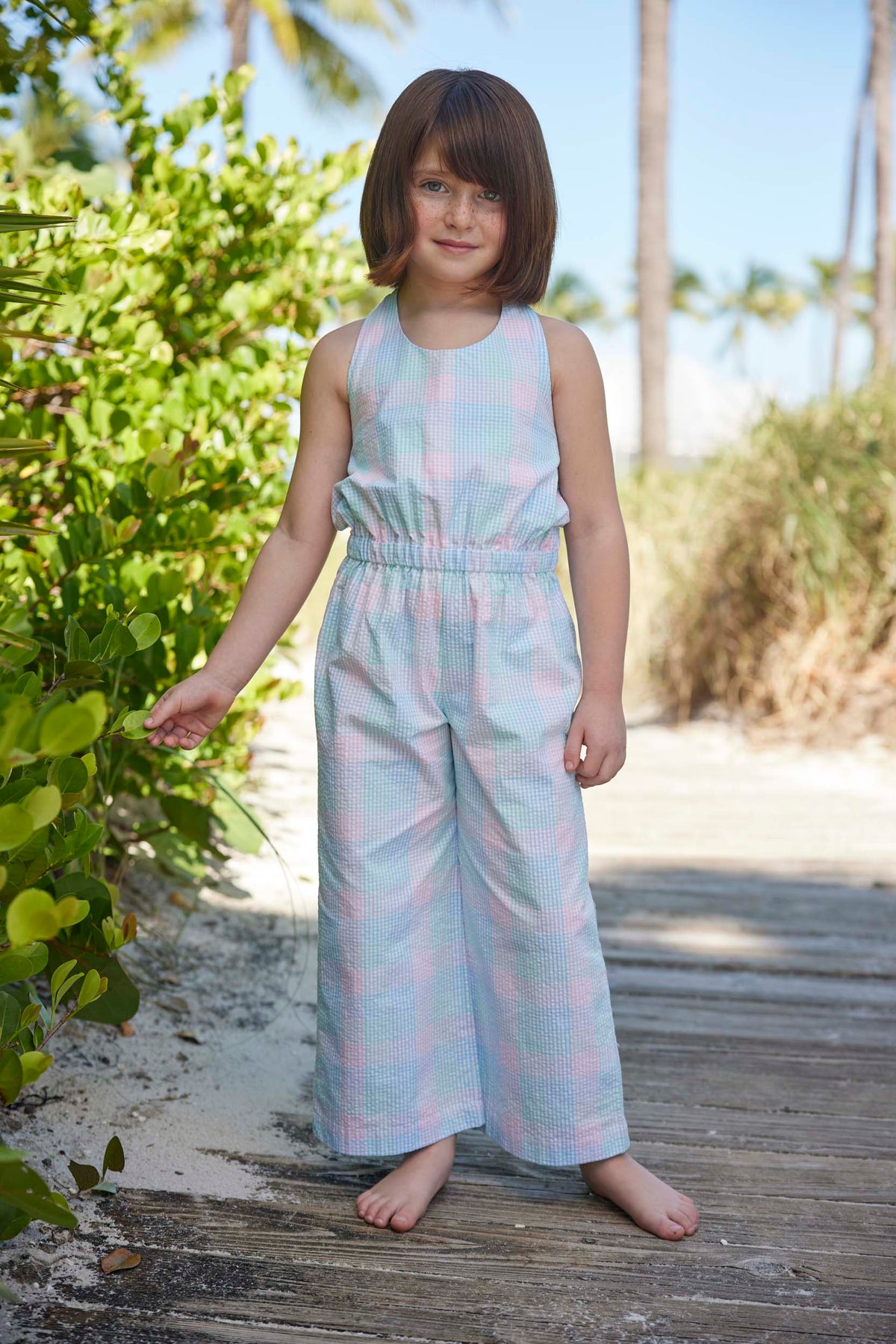 classic childrens clothing girls halter jumpsuit with flare legs in pink and blue plaid