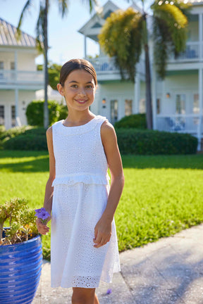 classic childrens clothing girls white eyelet dress with ruffle trim around waist and neckline