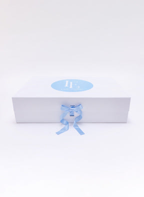 seguridadindustrialcr large gift box with blue ribbon and logo