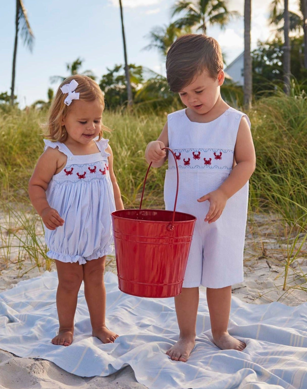 classic childrens clothing girls bubble with angel sleeves and smocking crab detail