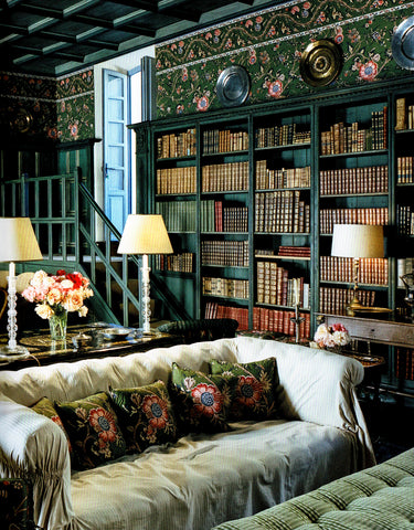 From the book, The Last Swan, the music room has wicker chairs by Res Nova, Turin, and an eighteenth-century Venetian walnut table. Marella Agnelli designed the green-and-pink floral fabric on the walls, curtains, and furniture.