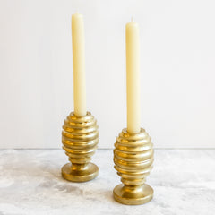 Remains Lighting Serif Candlesticks in Burnished Brass